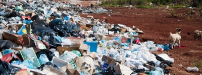 Mountain of rubbish and garbage on the beach by the sea